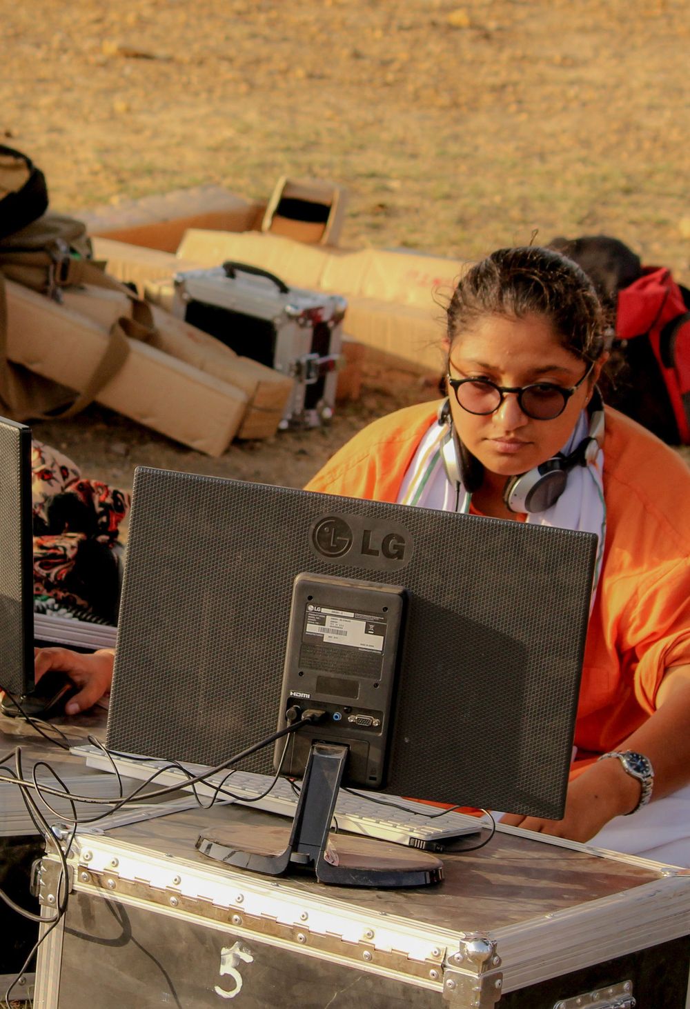 Ayesha Vasdev at the editing monitor on location